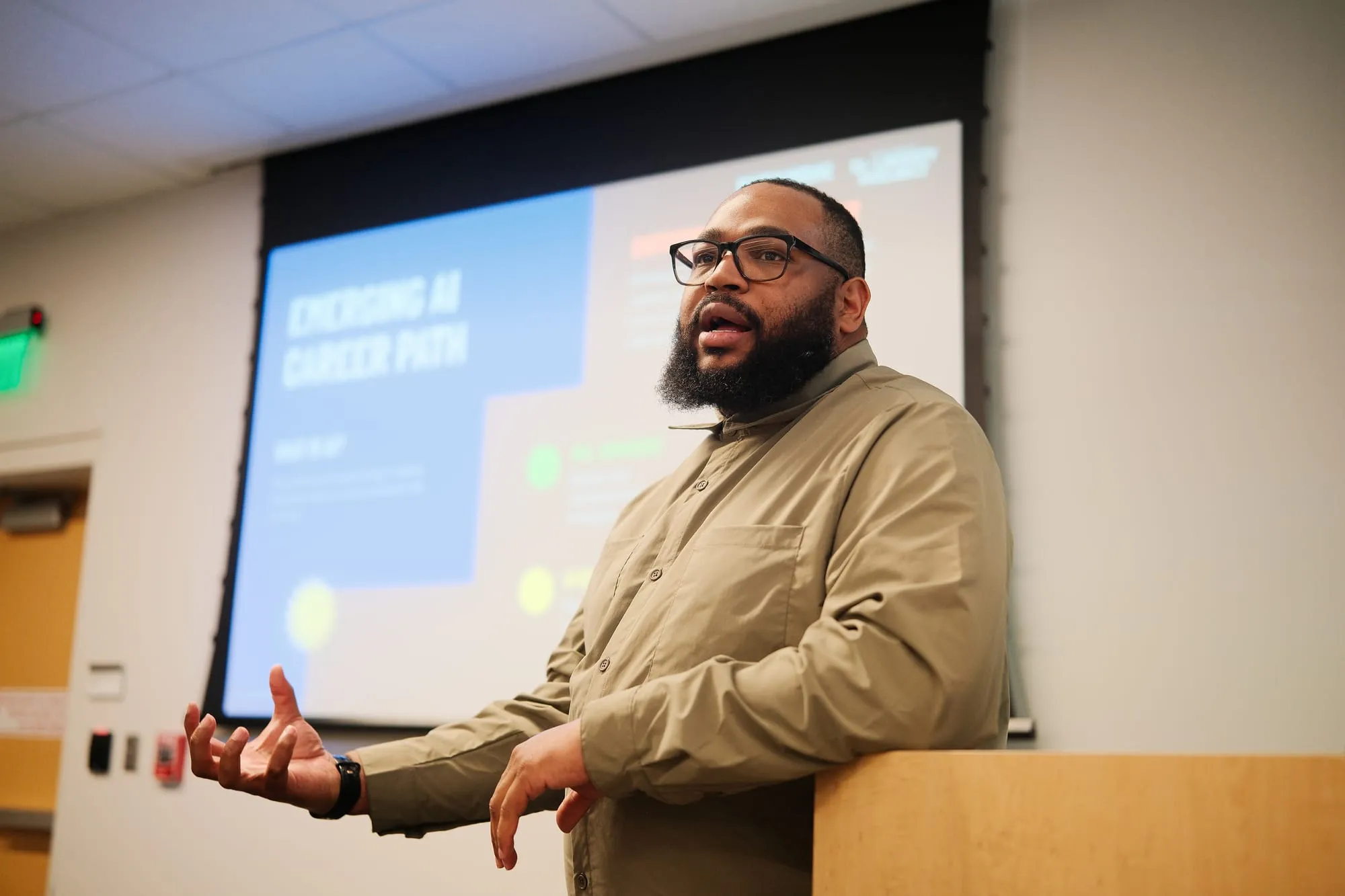 Marlon Avery speaking from a lectern